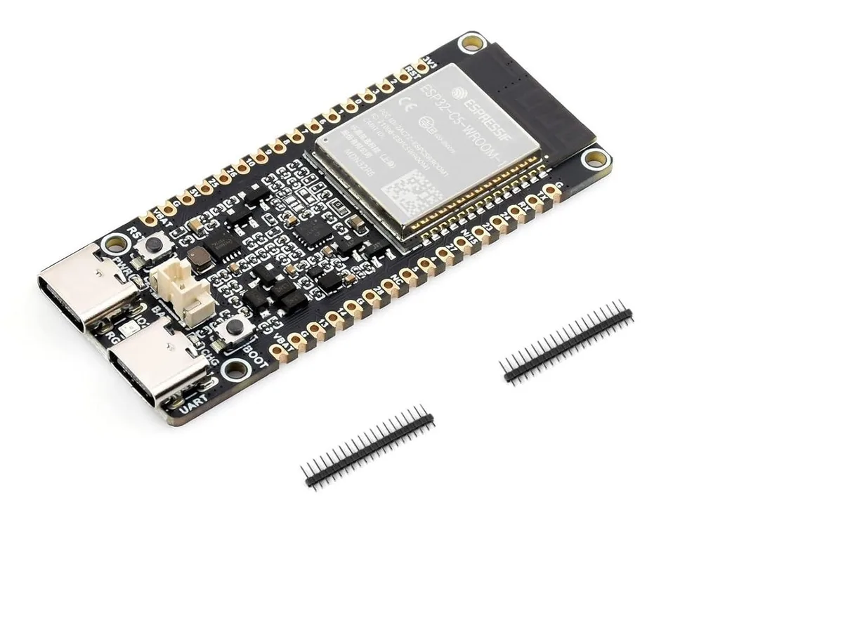 Small green circuit board with silver USB-C port and metal shielded module