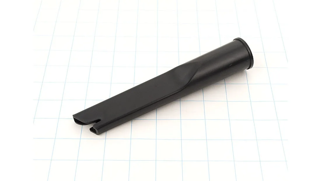 Black plastic crevice tool with narrow angled nozzle