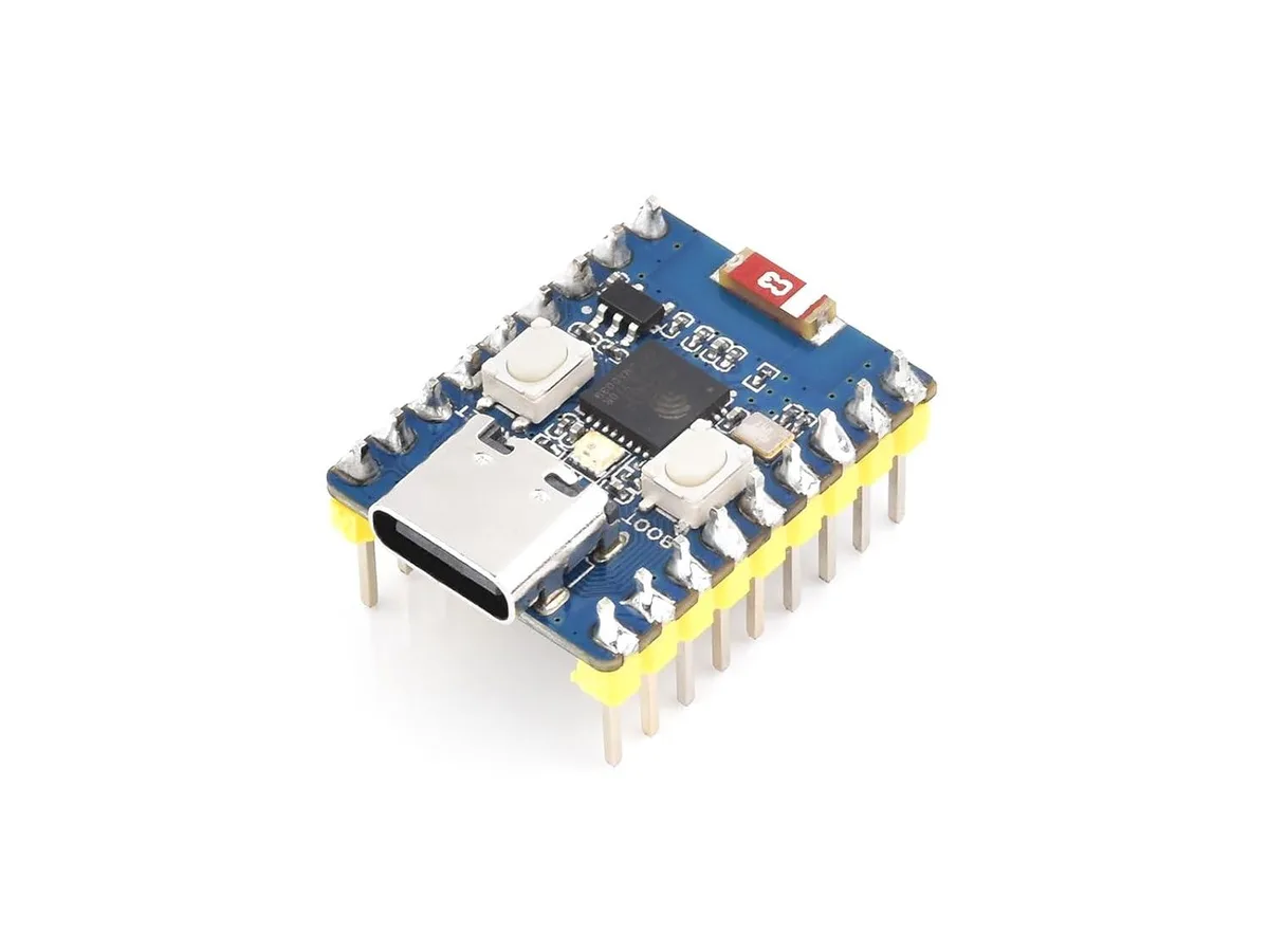 Small green circuit board with USB-C port and pre-soldered pin headers