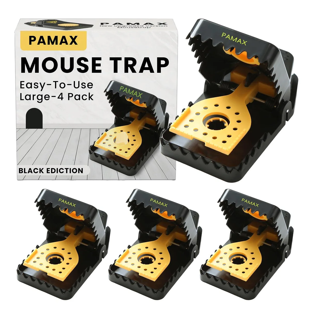 Four white plastic snap mouse traps on a surface
