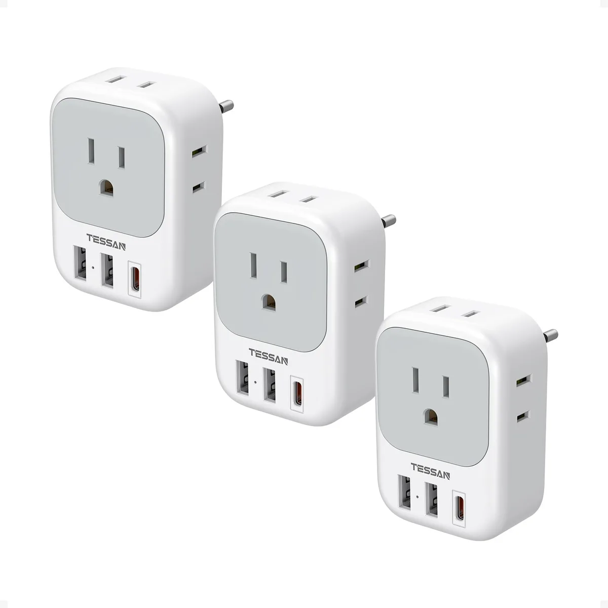 Three black travel adapters with Type C plugs and multiple ports