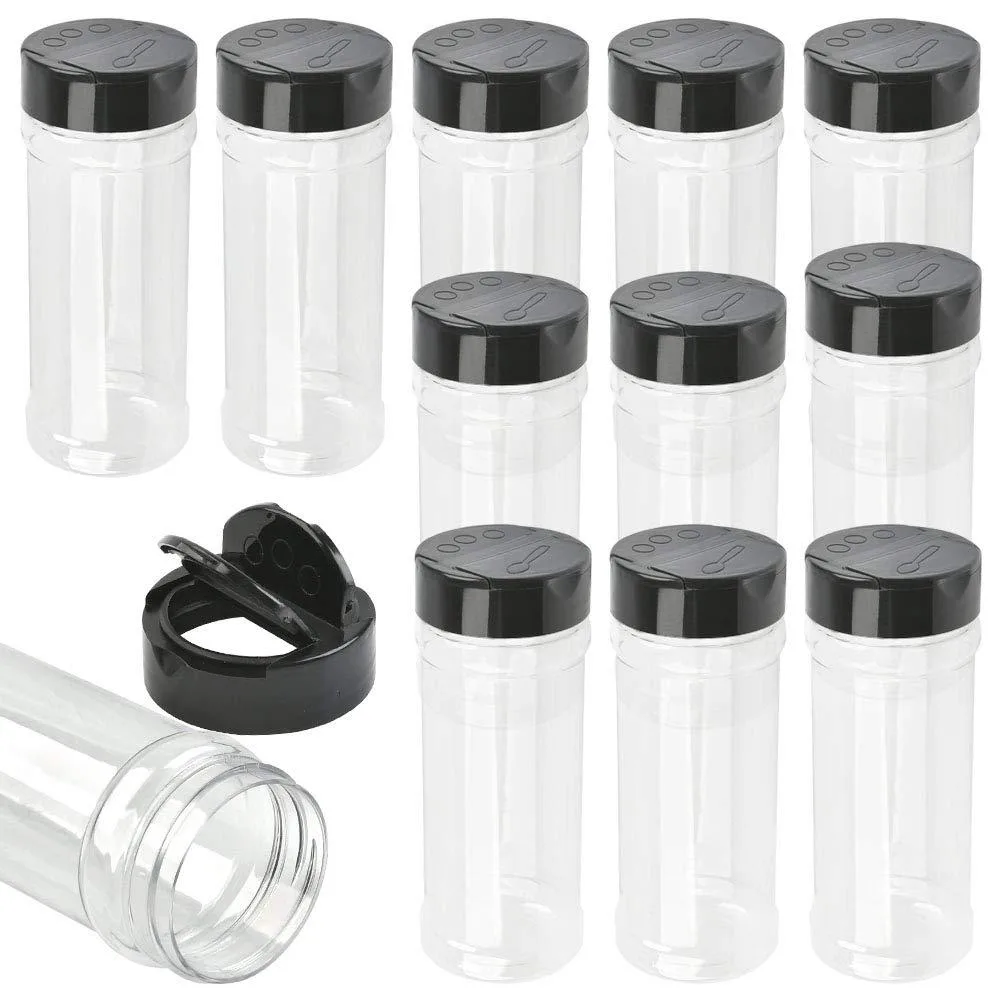 Twelve red plastic spice jars with black caps and shaker lids