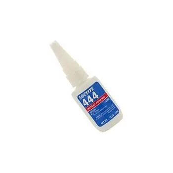 Small clear adhesive bottle with screw cap