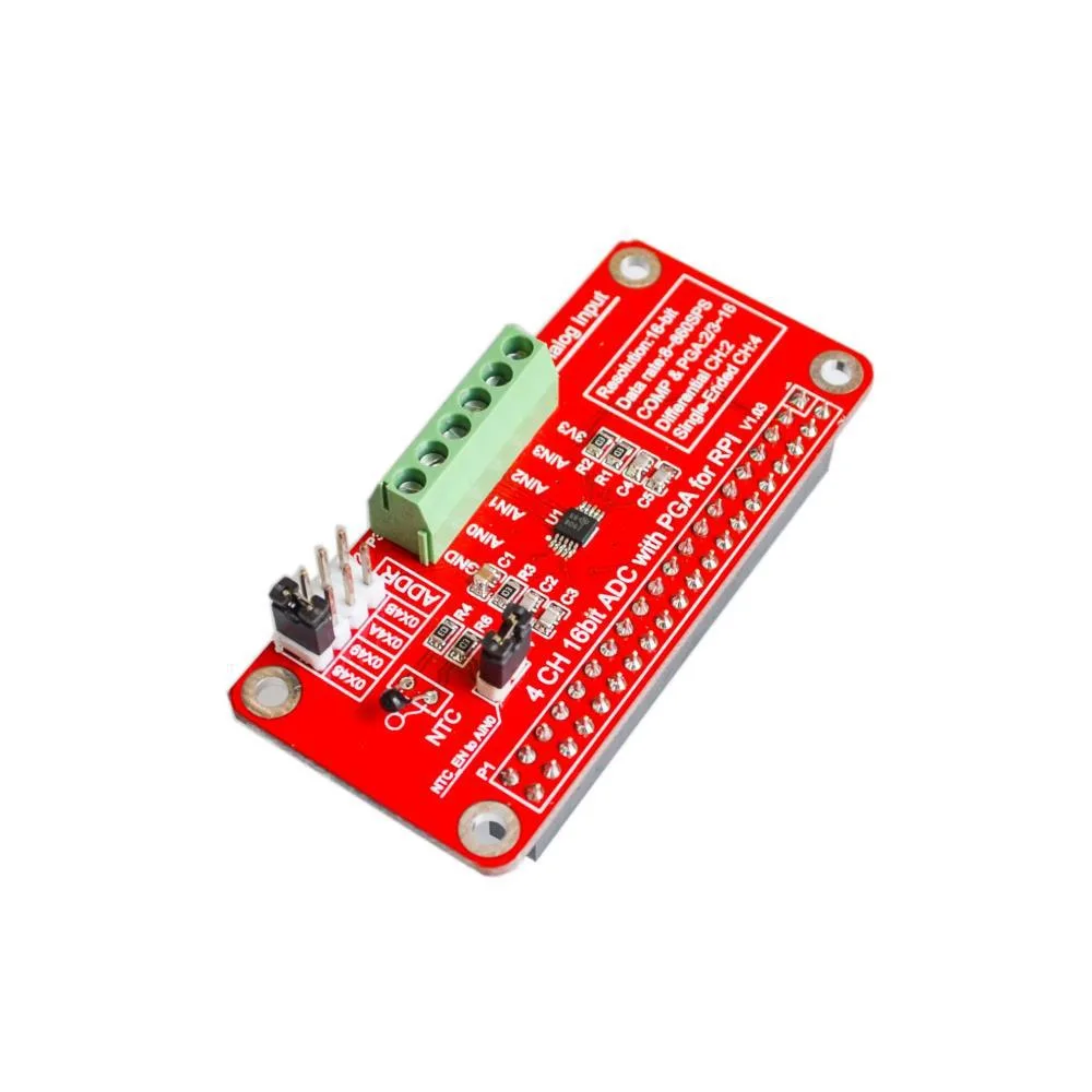 Small green circuit board with four input pins and a black integrated circuit chip