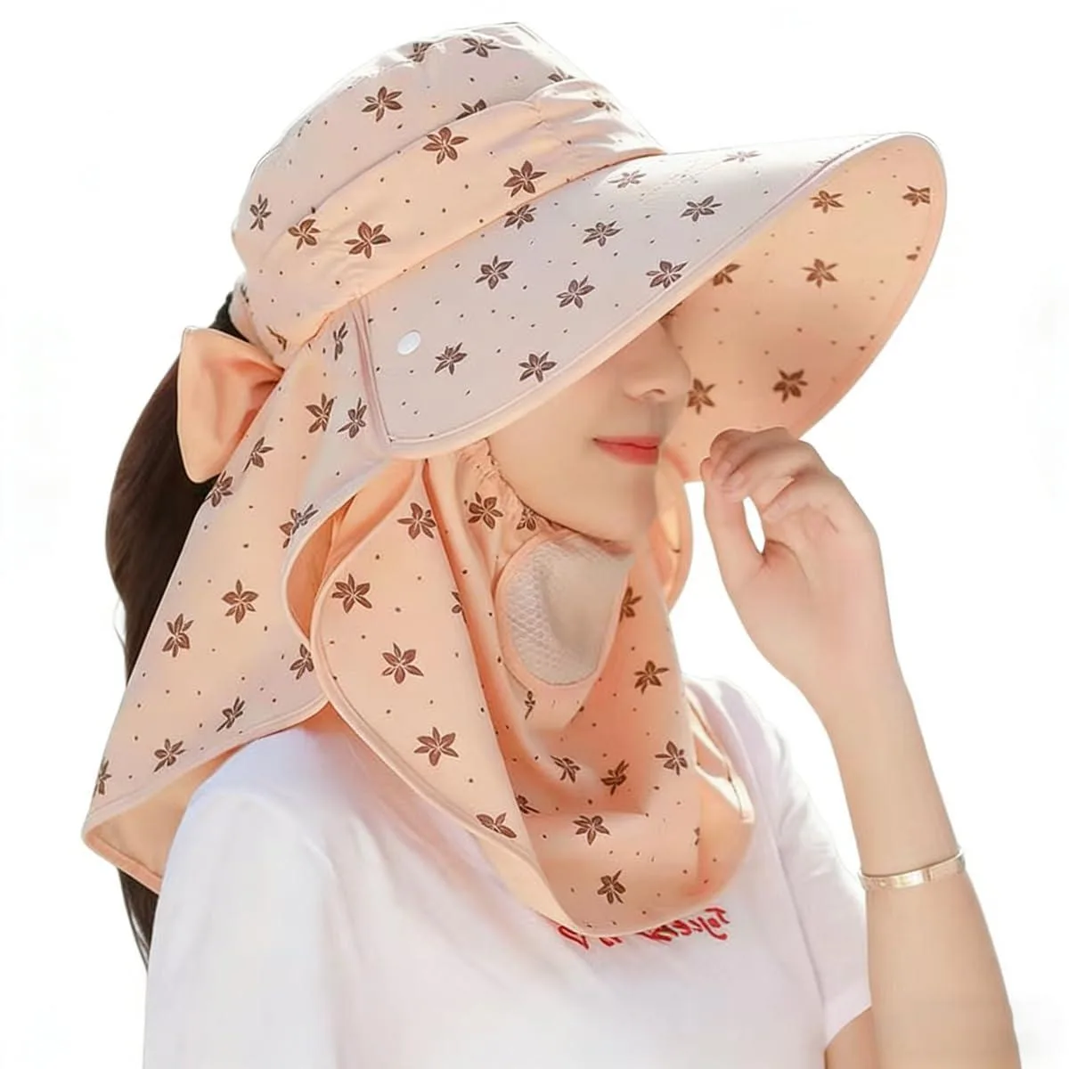 Wide-brim beige sun hat with detachable neck flap and face cover, black floral pattern, adjustable chin strap