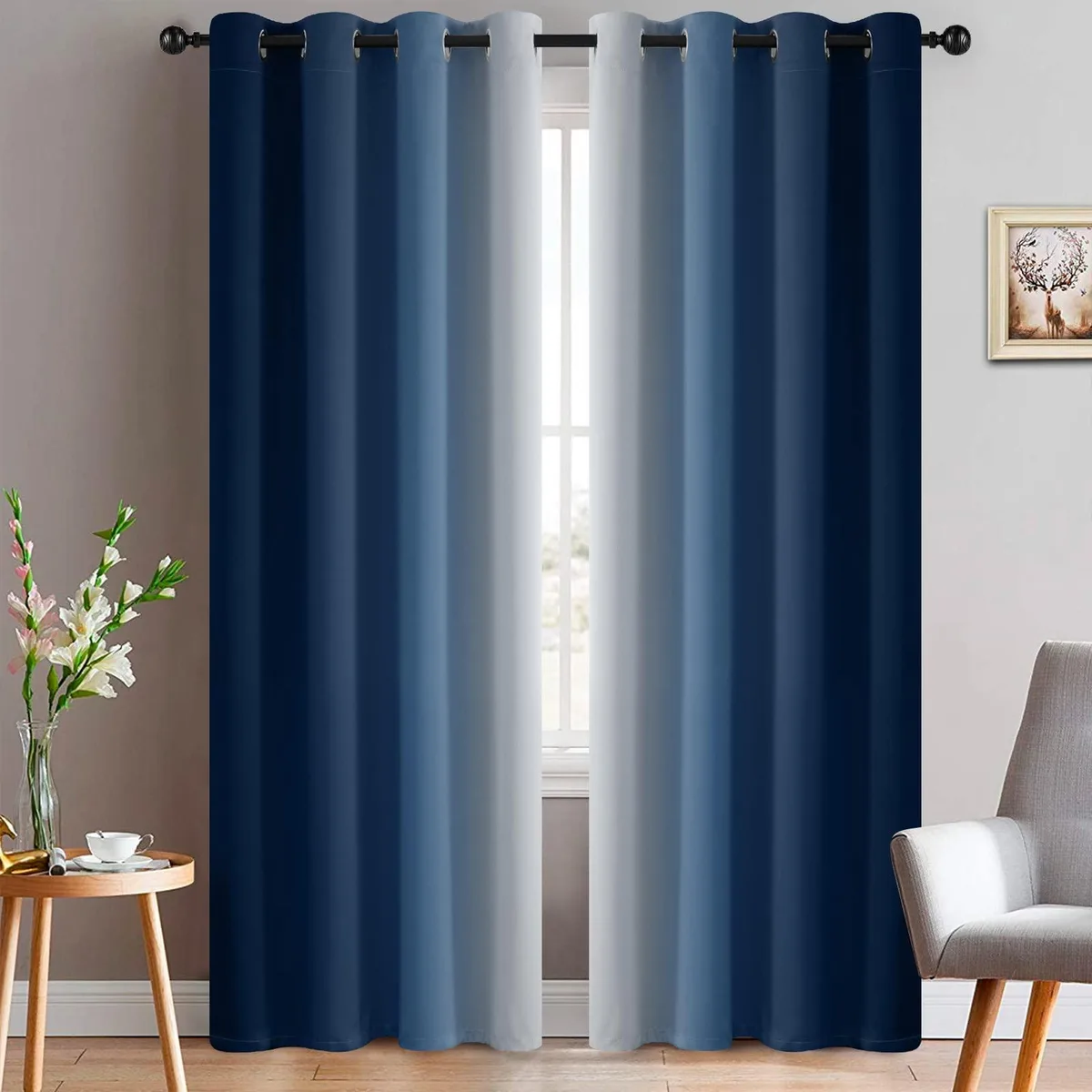 Two blue ombre curtain panels with silver grommets, 52 by 84 inches, polyester