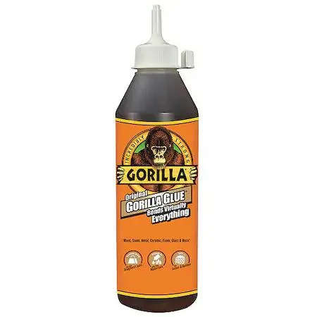 Yellow 18 oz epoxy adhesive syringe with applicator tip