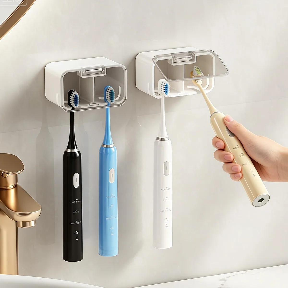 Two polished chrome wall-mounted toothbrush holders with hinged covers and ventilated slots