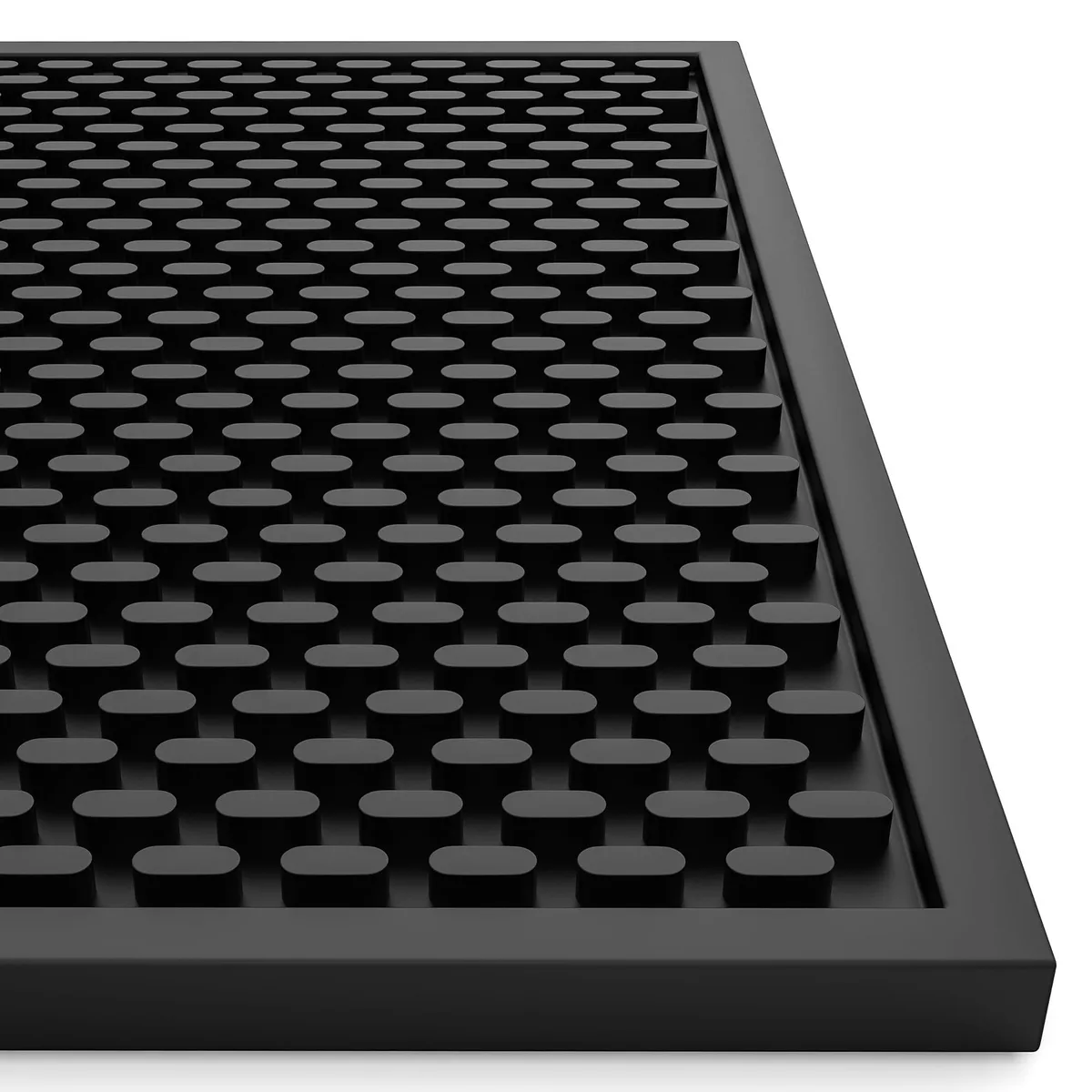Rectangular 18 by 12 inch silicone mat half inch thick with textured surface