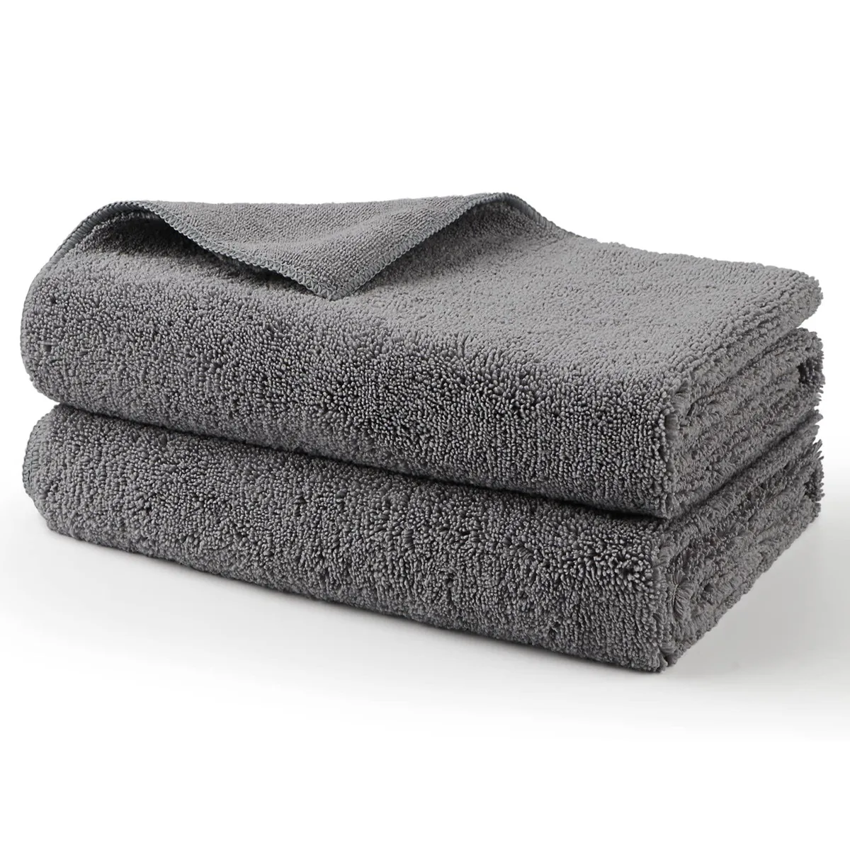 Two folded grey microfiber towels in a bag, each 31 by 24 inches