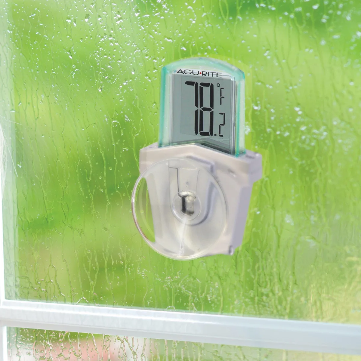 White digital window thermometer with suction cup mount and LCD display
