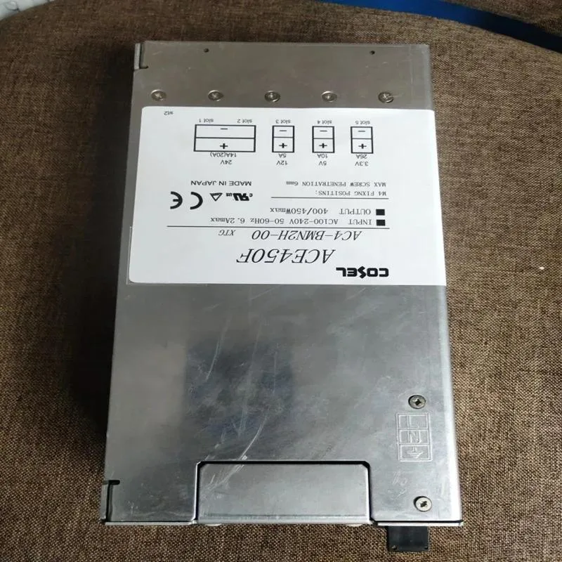 Rectangular ATX power supply unit with matte black finish and cooling fan grille