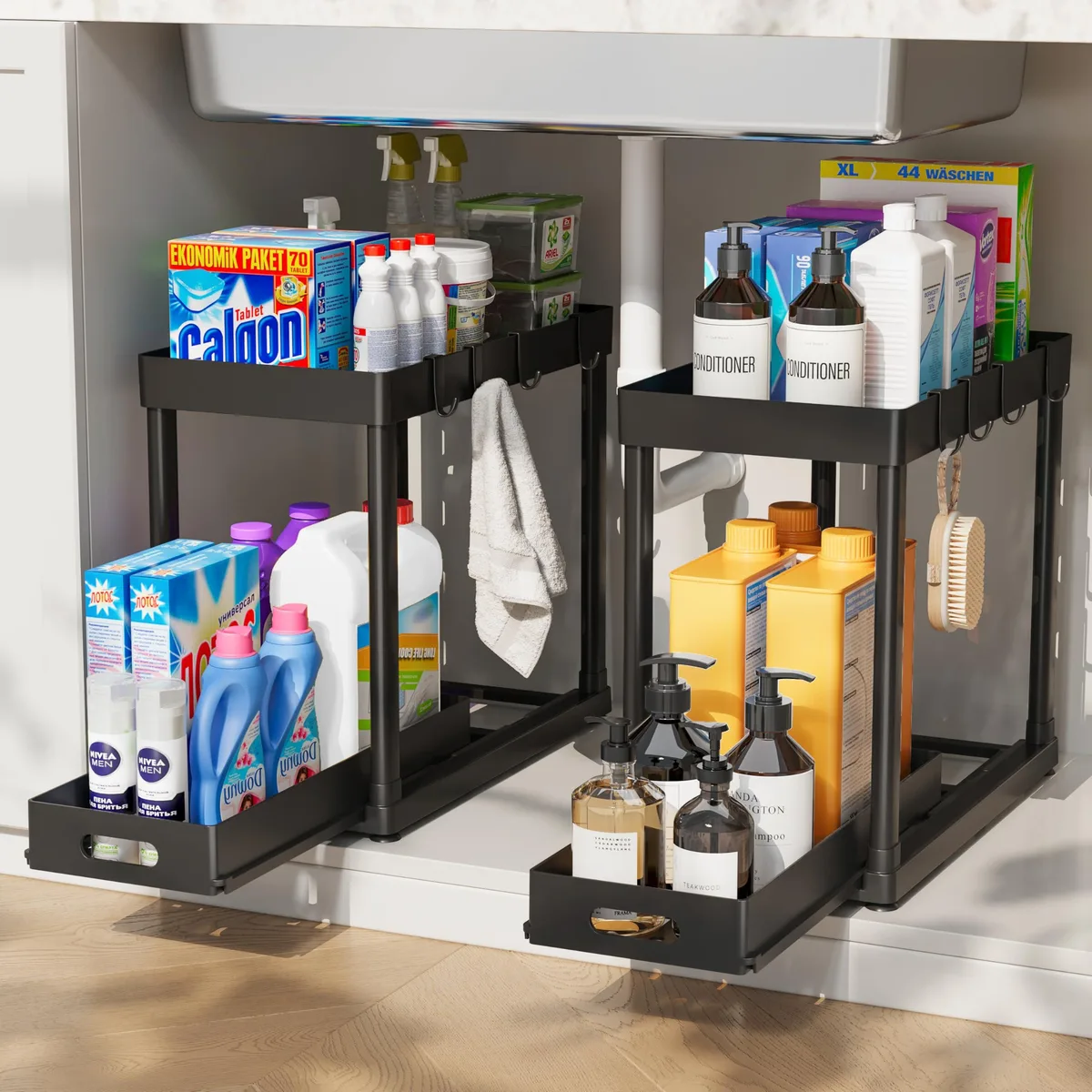 Two black plastic pull-out organizers with anti-slip bases and dual sliding drawers