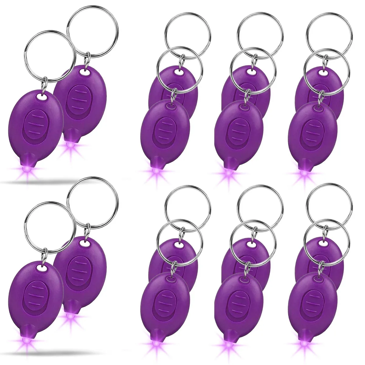 Sixteen tiny UV keychain lights on rings, matte plastic finish