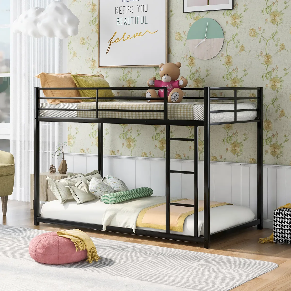 Black steel twin-over-twin bunk bed with ladder and guardrails