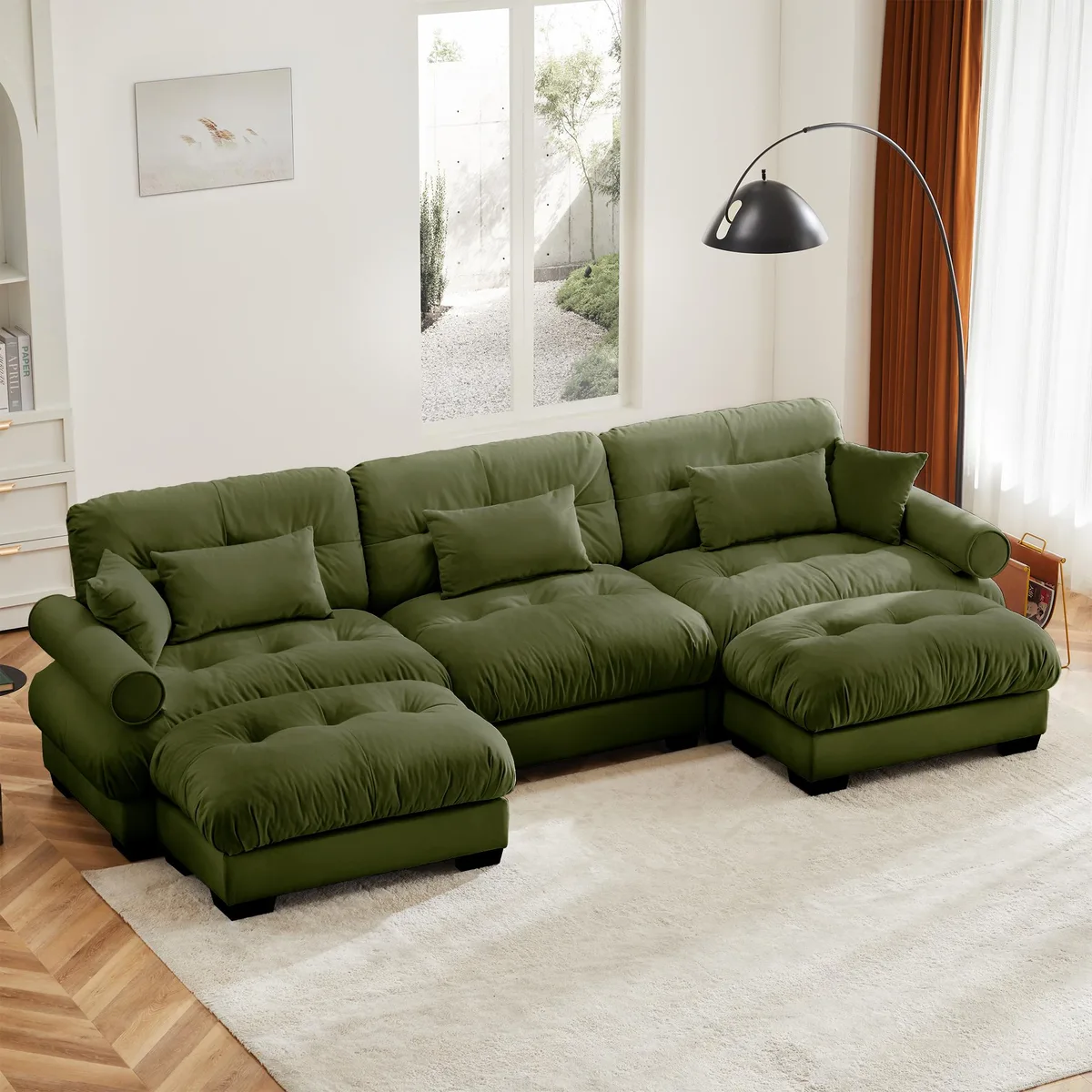 Olive green modular U-shaped sectional sofa with two movable ottomans, bolstered armrests and throw pillows