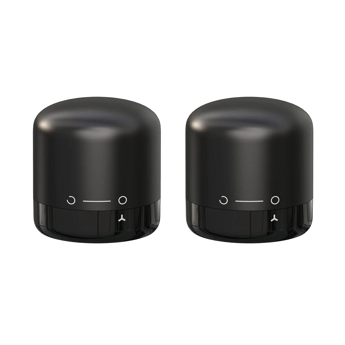 Two black silicone wine stoppers with twist-lock tops, compact cylindrical shape, matte finish