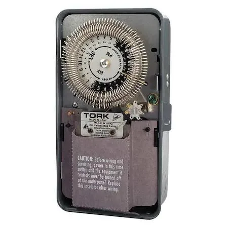 Gray metal electromechanical timer in steel enclosure