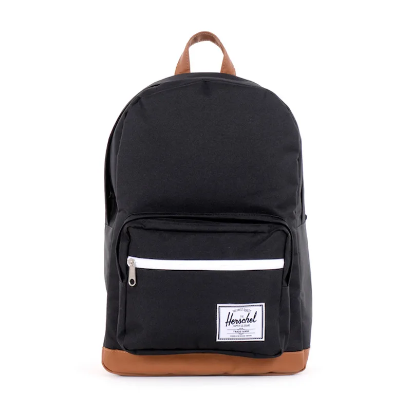 Black rectangular backpack with front zip pocket and top handle