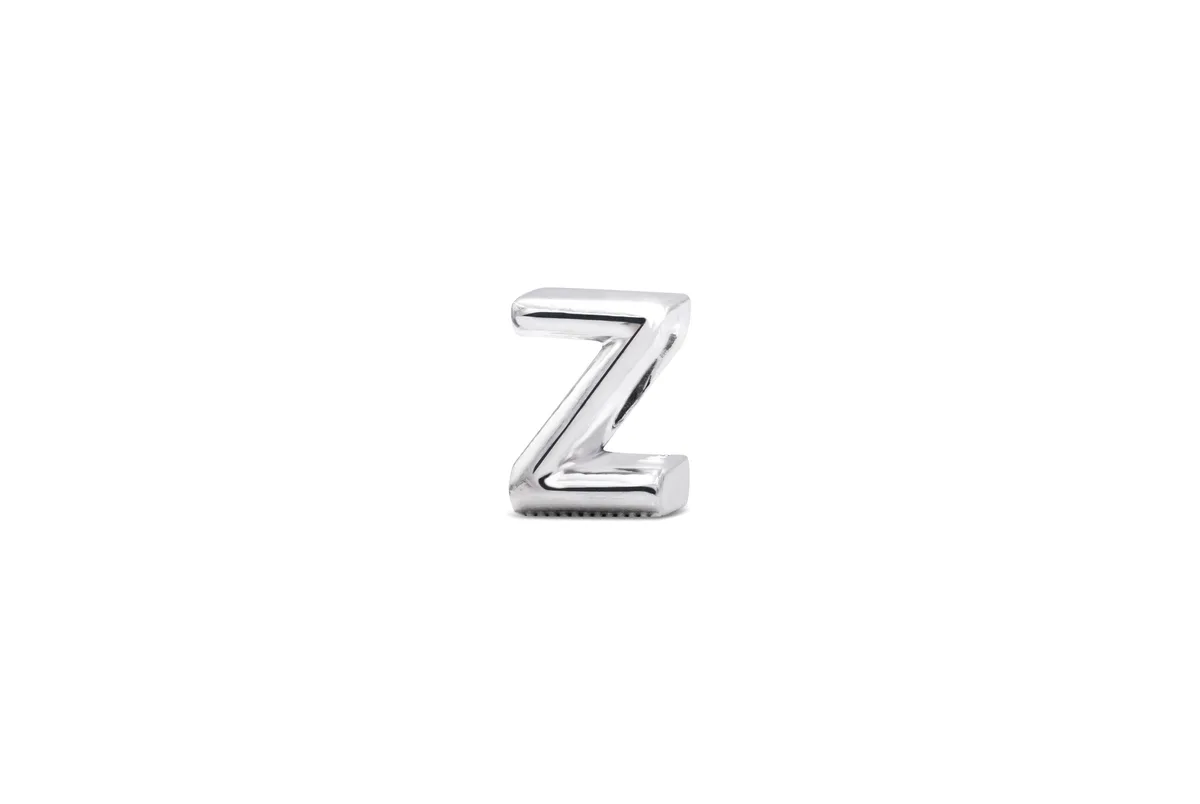 Small sterling silver charm shaped like the letter Z