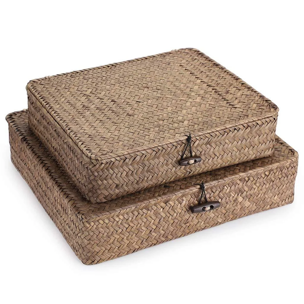 Two flat woven seagrass baskets with lids coffee colour small 11 inches large 13 inches