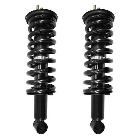 Two silver front strut assemblies with springs and mounts side by side