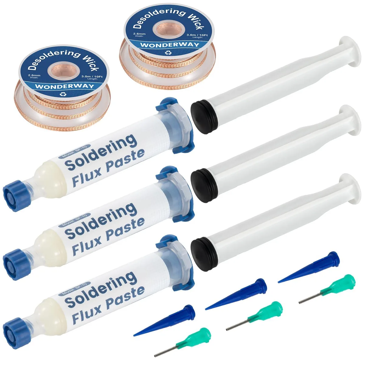 Three white flux pens and two copper desoldering wick spools in kit box