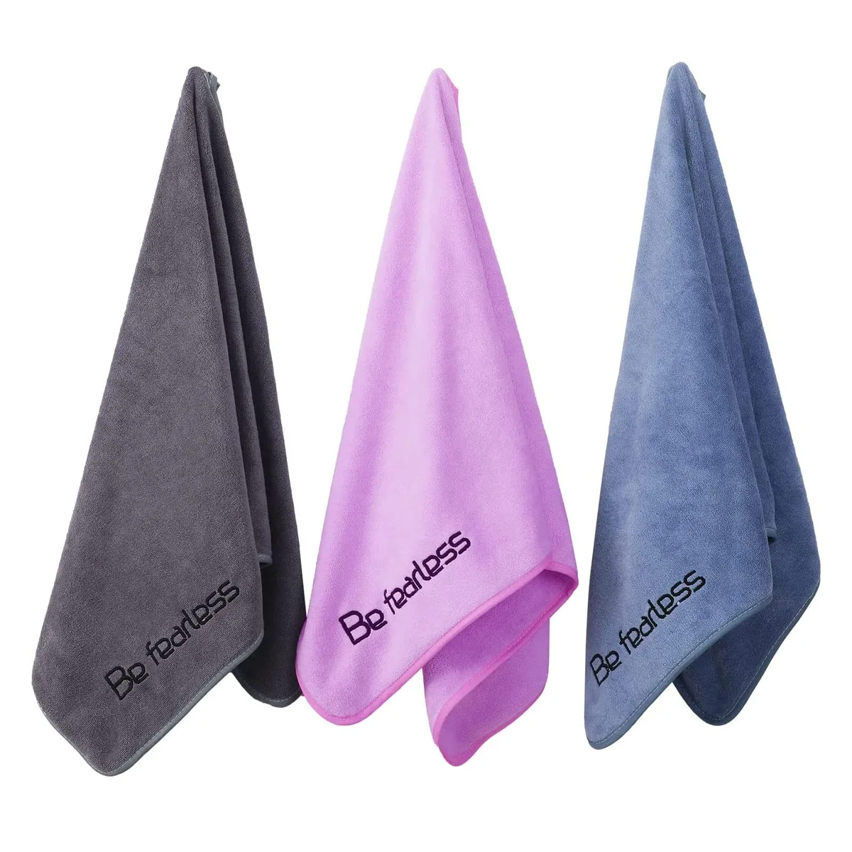 Three folded white microfiber gym towels with hanging loops