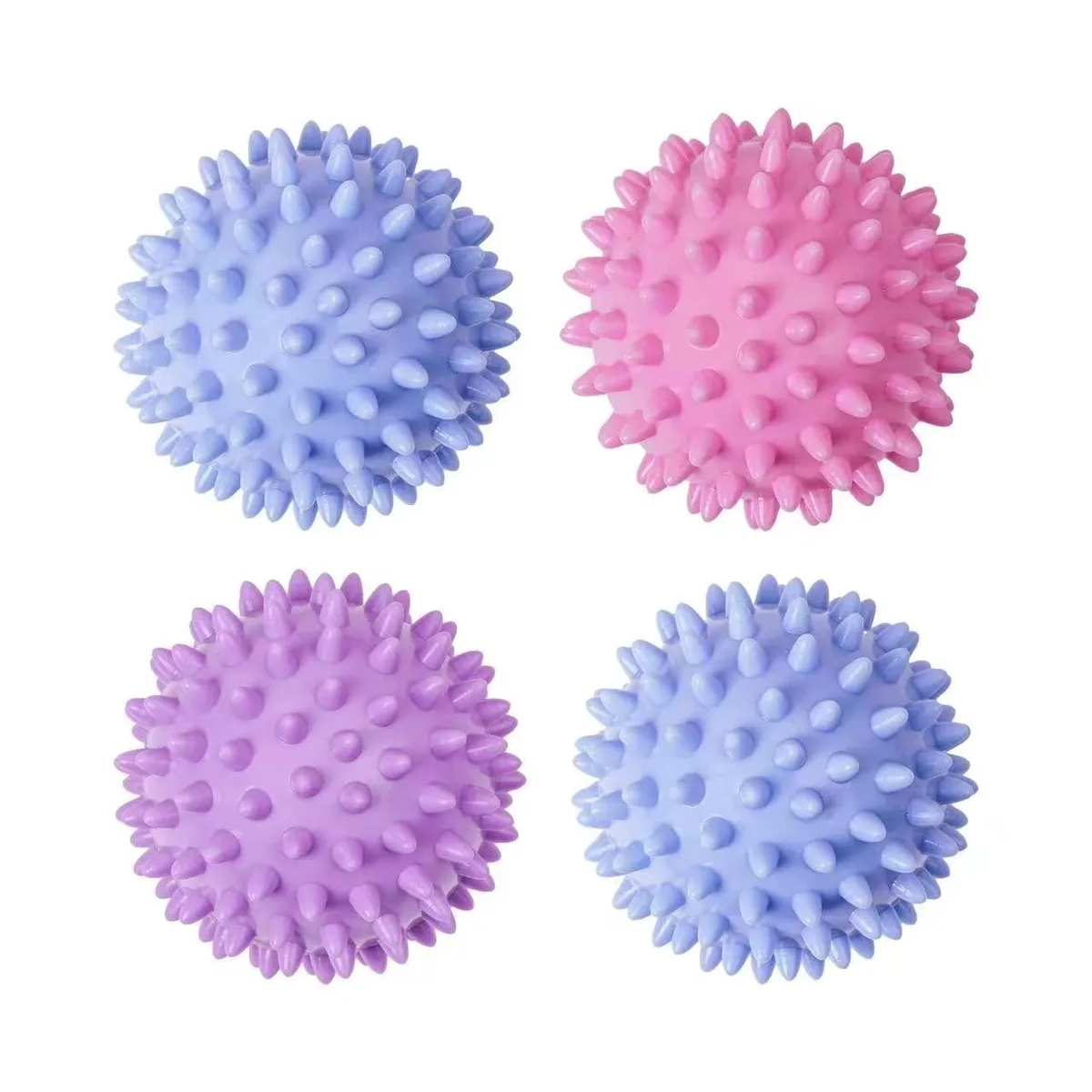 Four light-coloured silicone dryer balls in a set