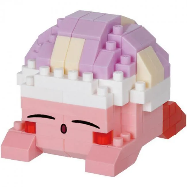 Small pink Kirby figure sleeping face down, built from tiny bricks, palm sized, 160 pieces