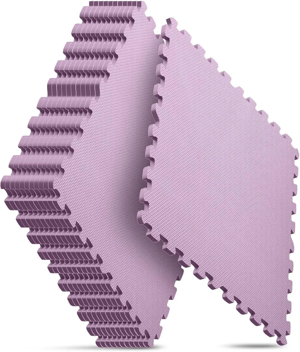 Thirty-two pink EVA foam tiles with puzzle edges and textured surface laid in a grid