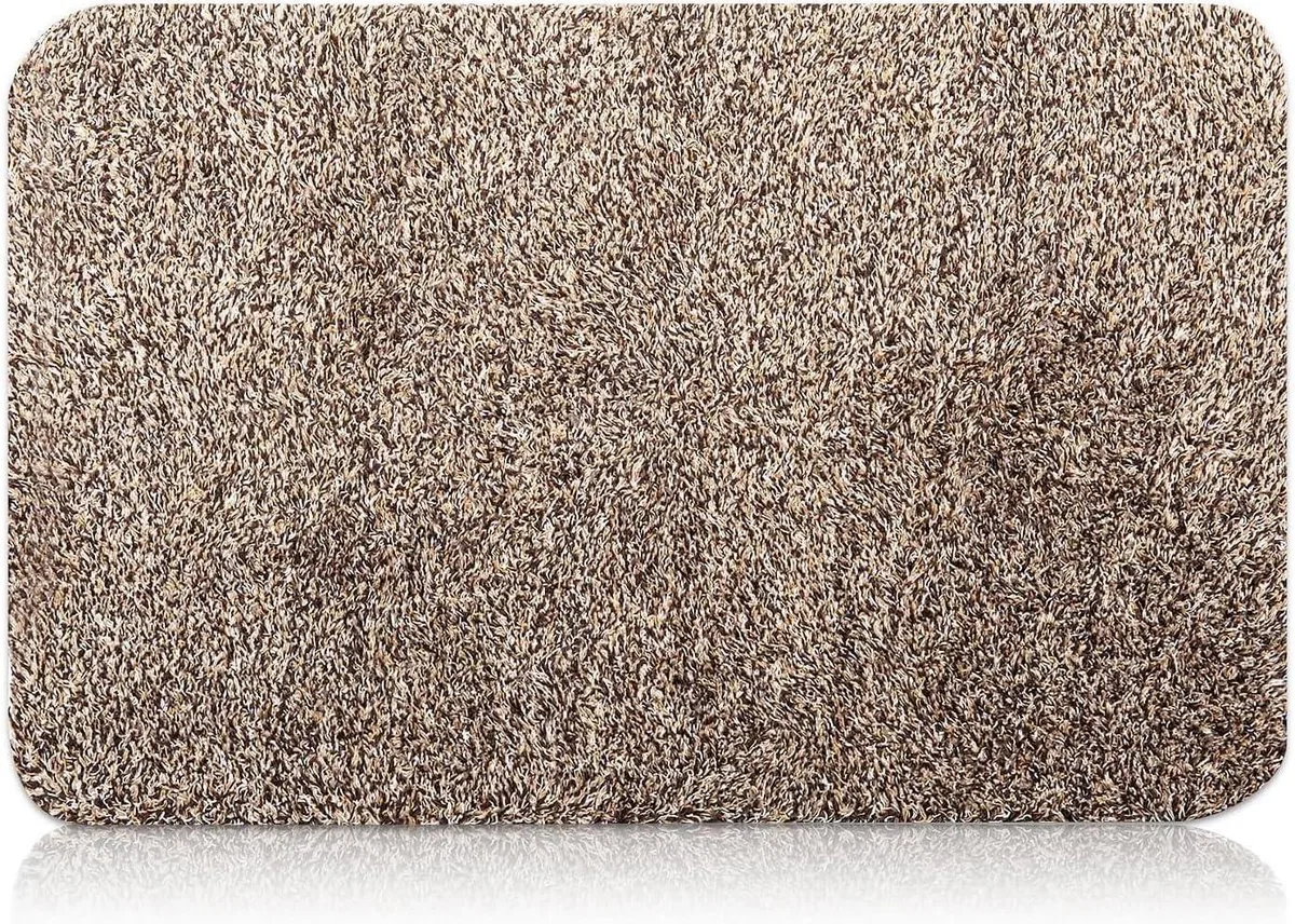 Brown rectangular doormat with low-profile surface and latex backing, 36 by 24 inches