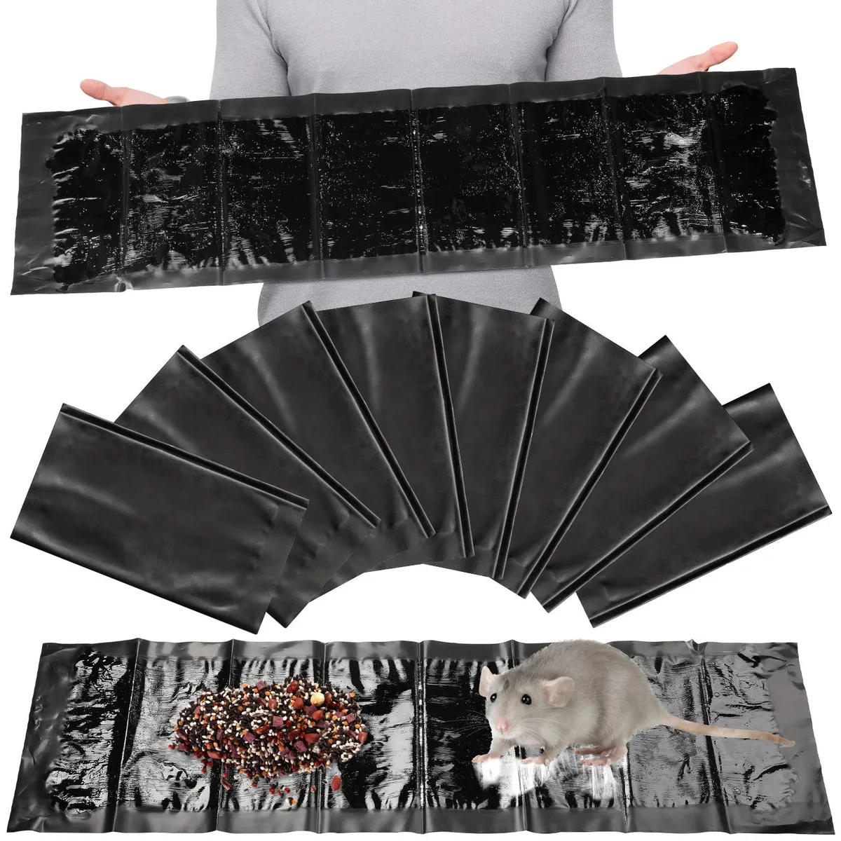 Eight flat black sticky traps each 24 by 11 inches