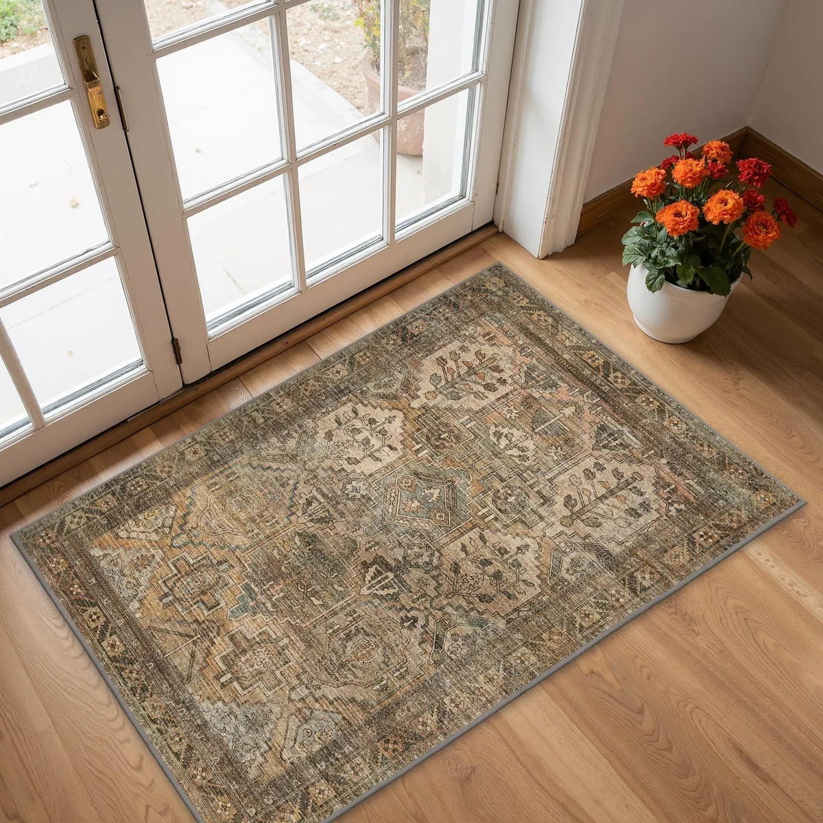Rectangular taupe polyester rug with woven texture and low pile