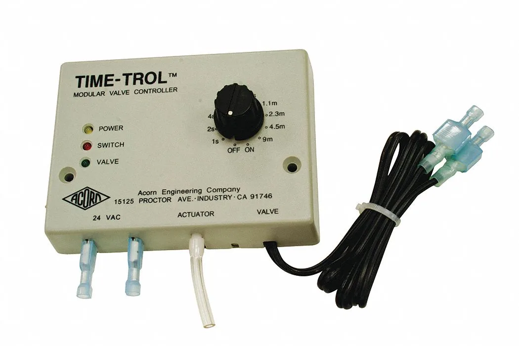 White plastic rectangular controller box with front panel buttons and display