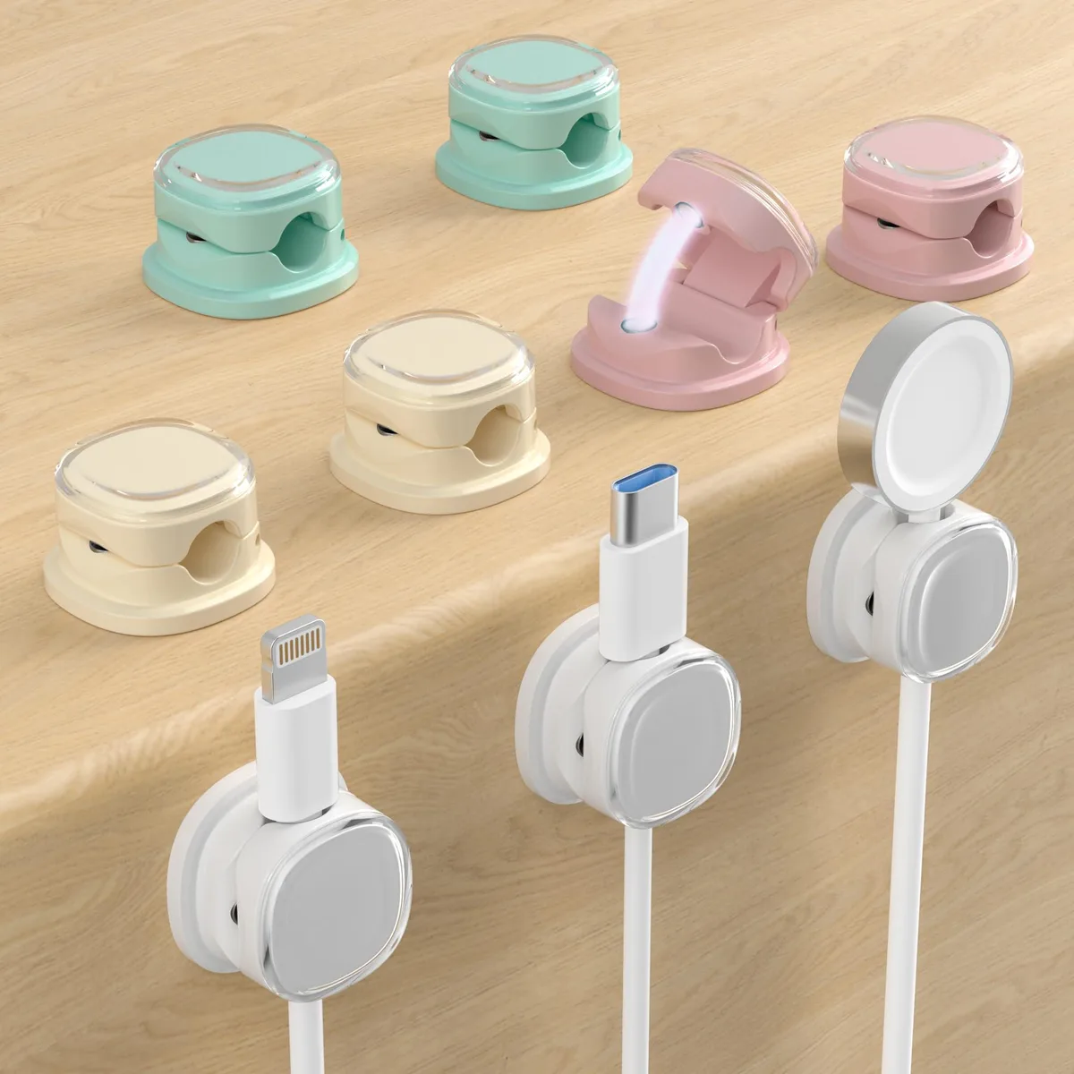 Nine small plastic magnetic clips in white, purple, cyan and apricot, each about point eight inches wide