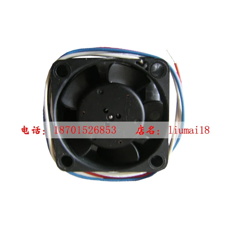 Small black Nidec case fan with model label
