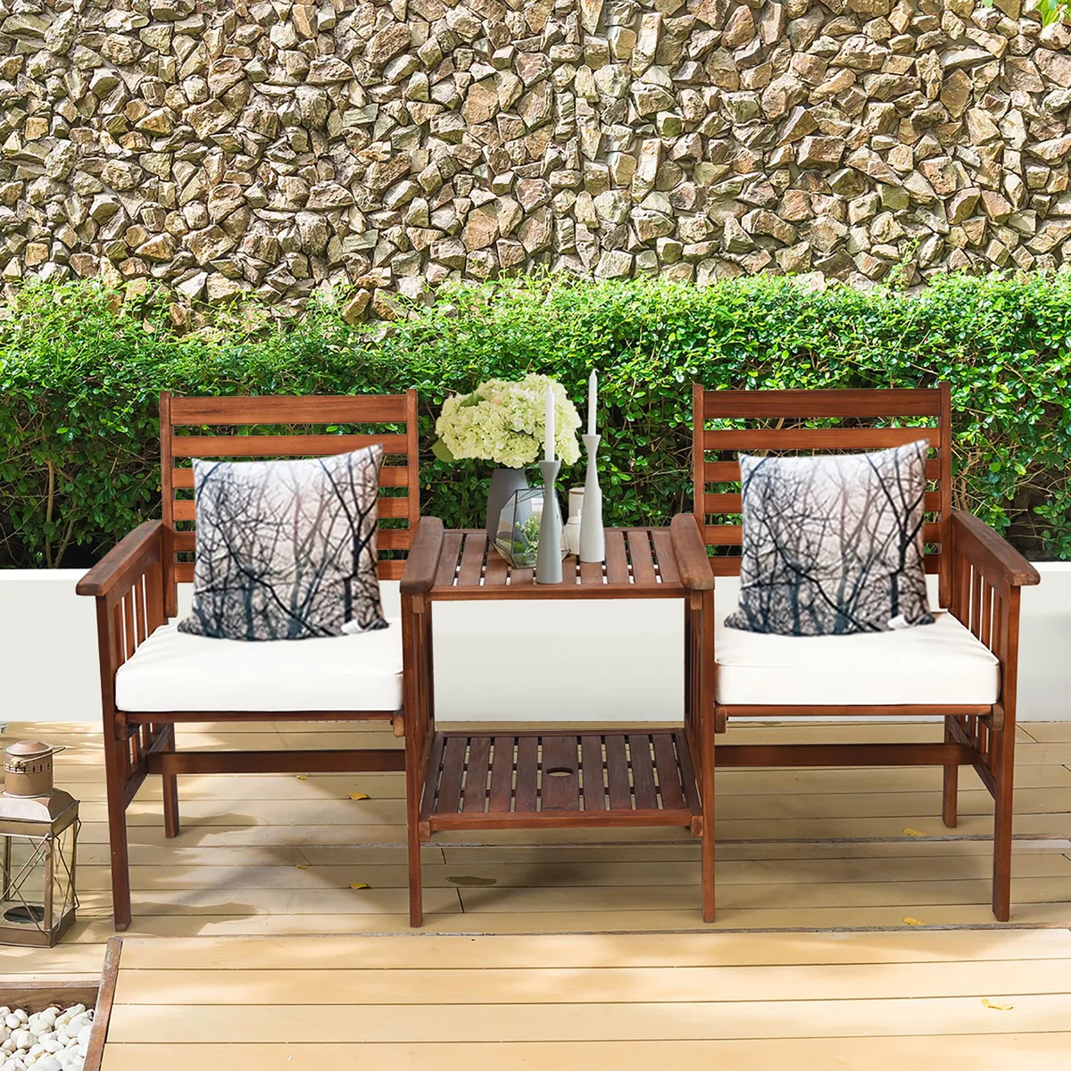 White acacia wood loveseat set with cushions and two-tier coffee table, umbrella hole visible