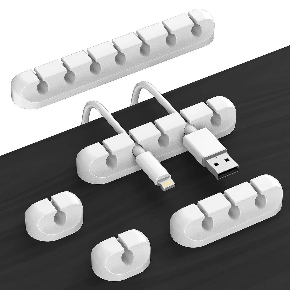 White silicone cord organiser set, five pieces, self-adhesive, various slot counts