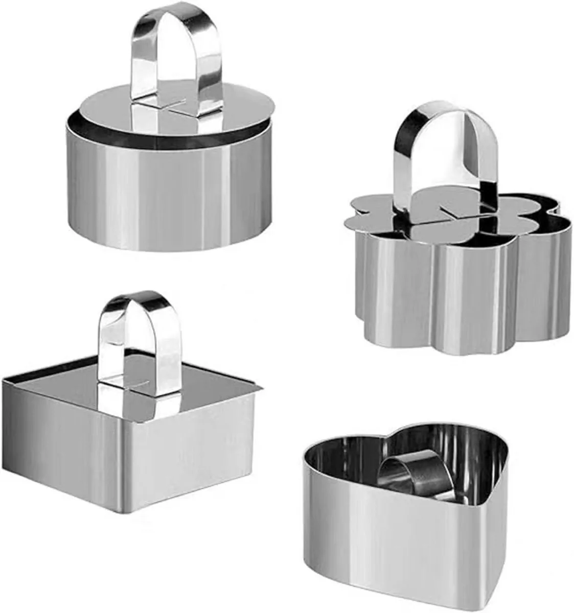 Four silver 430 stainless steel 3 inch cake rings with matching pushers in a gift box
