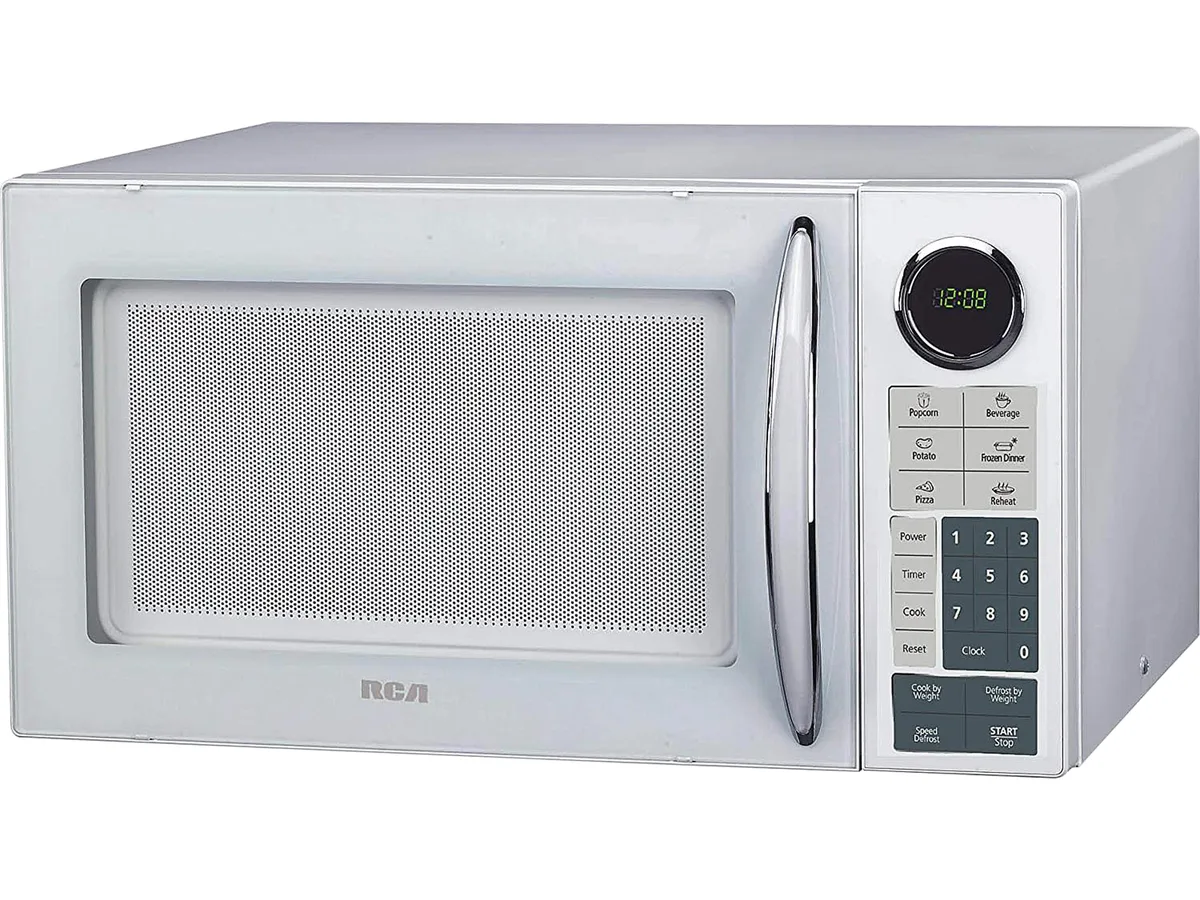CURTIS International. CURTIS International RCA RMW953-WHITE 0.9 cu ft 900 W microwave — product photo