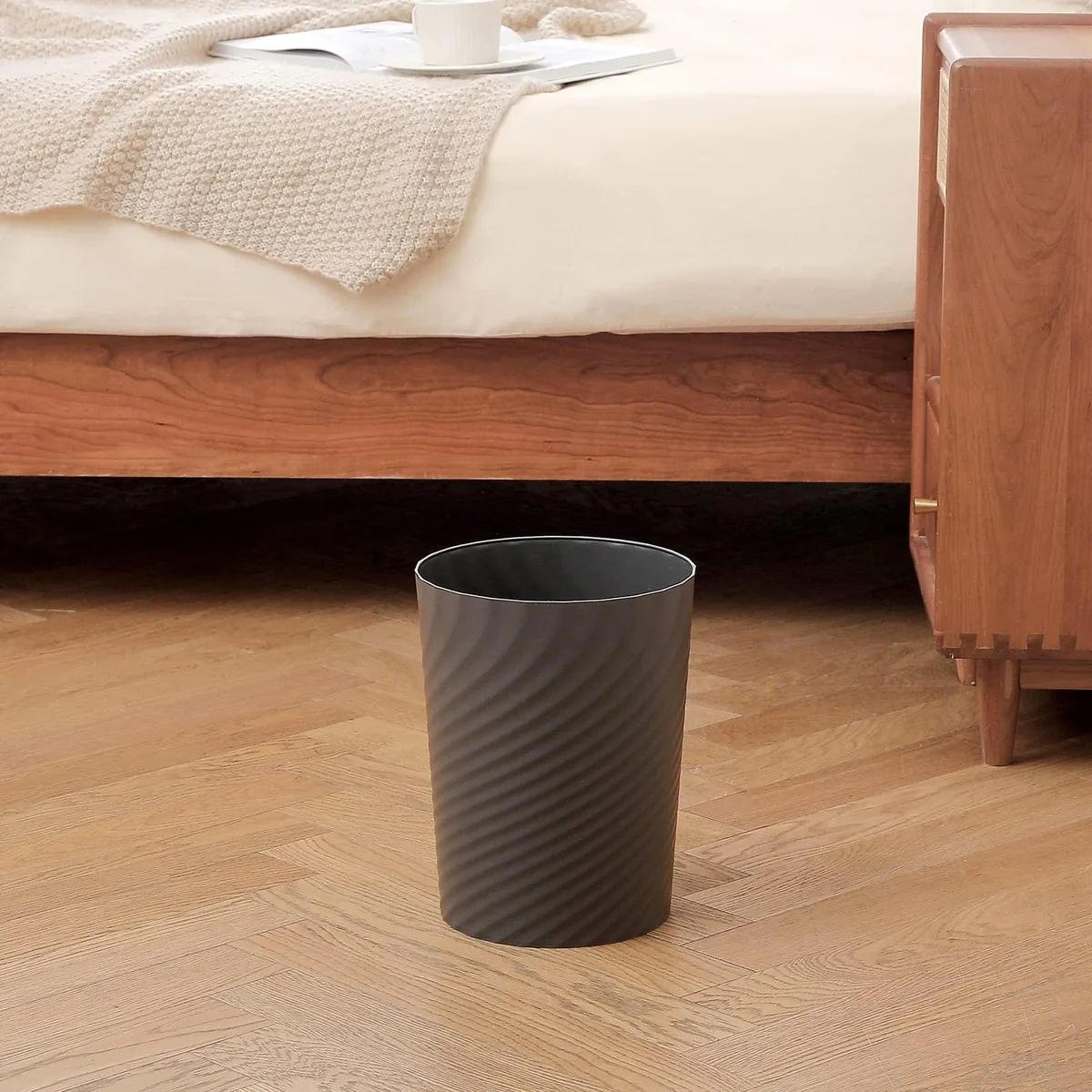 Twelve small dark grey plastic wastebaskets, 1.8 gallon capacity