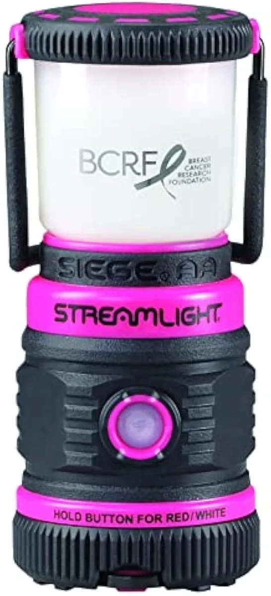 Pink ultra-compact lantern with removable glare-reducing cover, D-ring, and locking handle