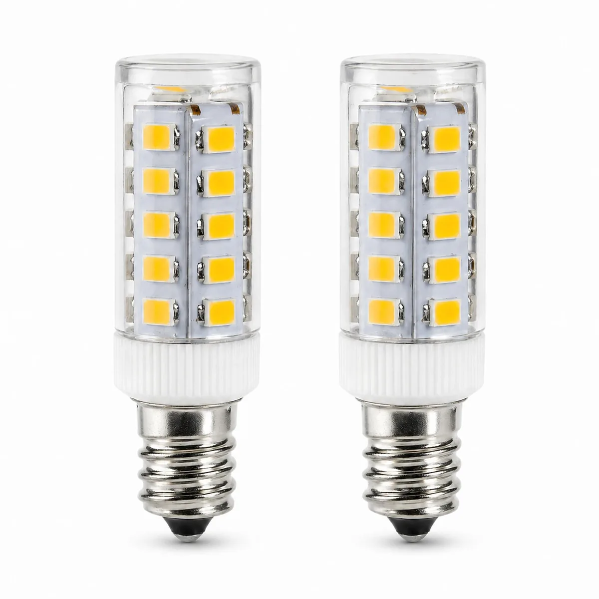 Two small candle-base LED bulbs with clear glass tips, warm white finish, sold as a pair