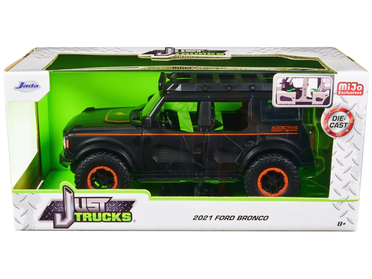 Jada Jada 2021 Ford Bronco 1/24 Matt Black Orange Stripes Roof Rack Addictive Desert Designs hobby collectible — product photo