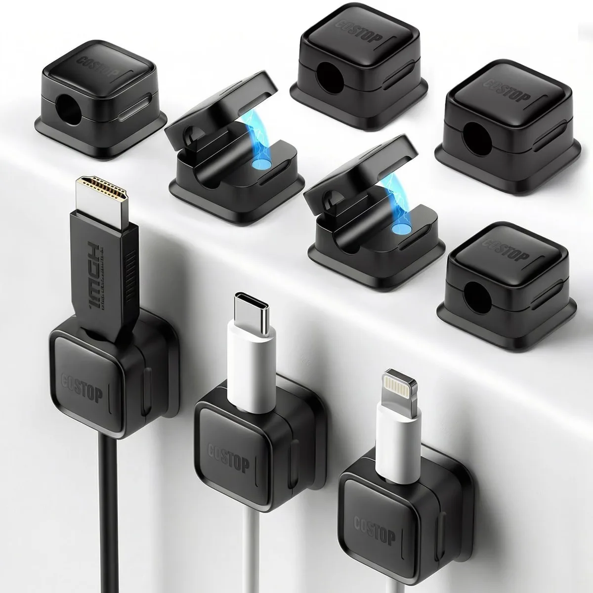 Nine small black square magnetic cable clips with adhesive backing