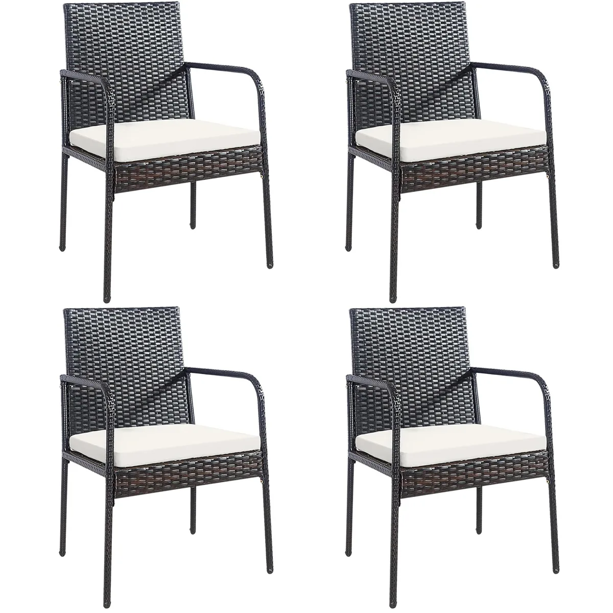 Four woven rattan dining chairs with cushions and armrests