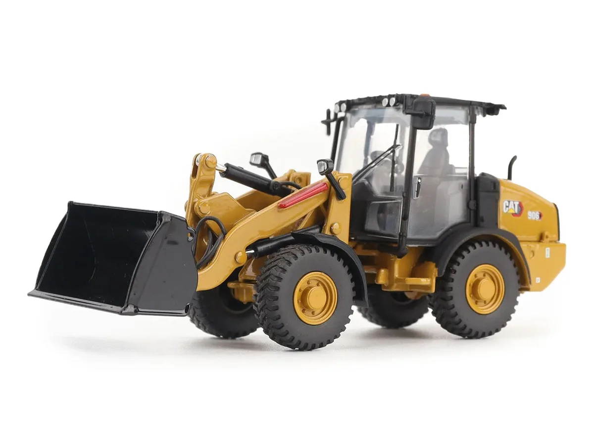 DieCast Masters DieCast Masters CAT 906 Compact Wheel Loader Yellow with Operator High Line Series 1/50 — product photo