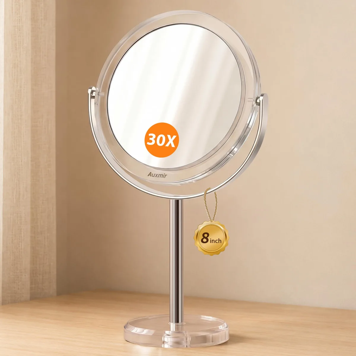 Round double-sided tabletop mirror on a stand, clear acrylic and metal frame, 14 by 8 inches