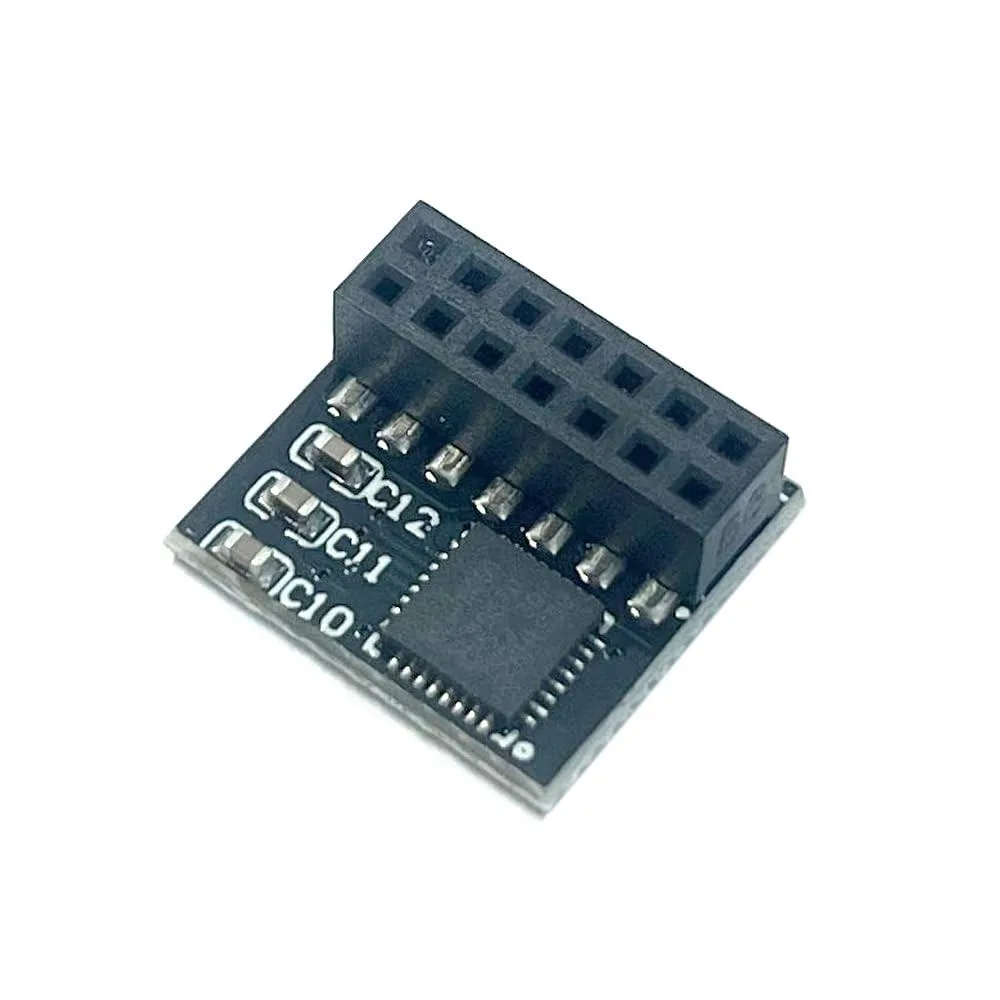 Small green circuit board with a 14-pin header and black security chip